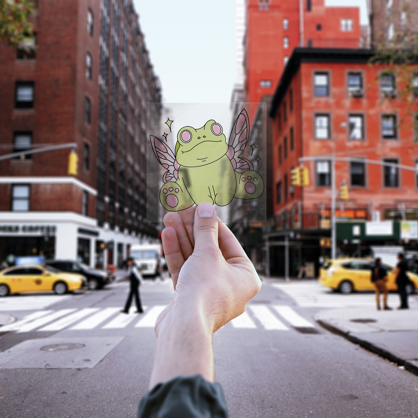 Stickers_-_Fairy_Frog_BY_Audi_Bell_ClearSquareSticker_Hand_Mockup.png