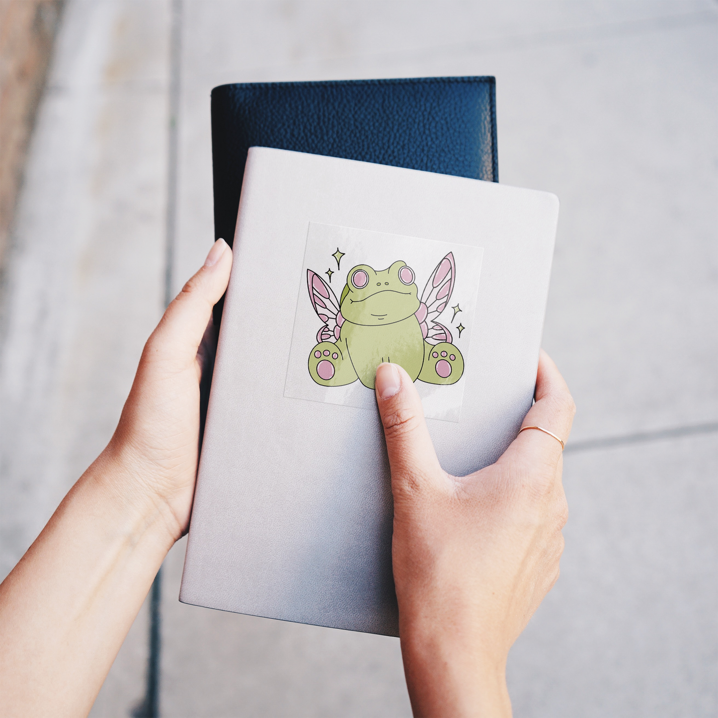Stickers_-_Fairy_Frog_BY_Audi_Bell_ClearSquareSticker_Notebook_Mockup.png