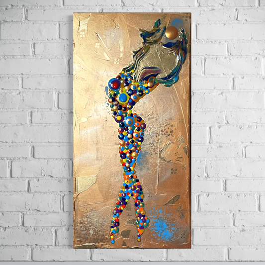 gold abstract of a girl made of circles holding up the sun over a gold background hanging on a white brick wall
