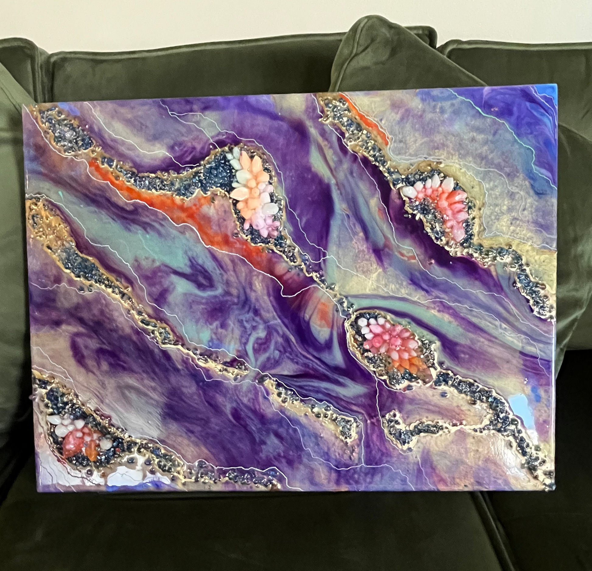 purple geode art with orange and white and pink crystals 